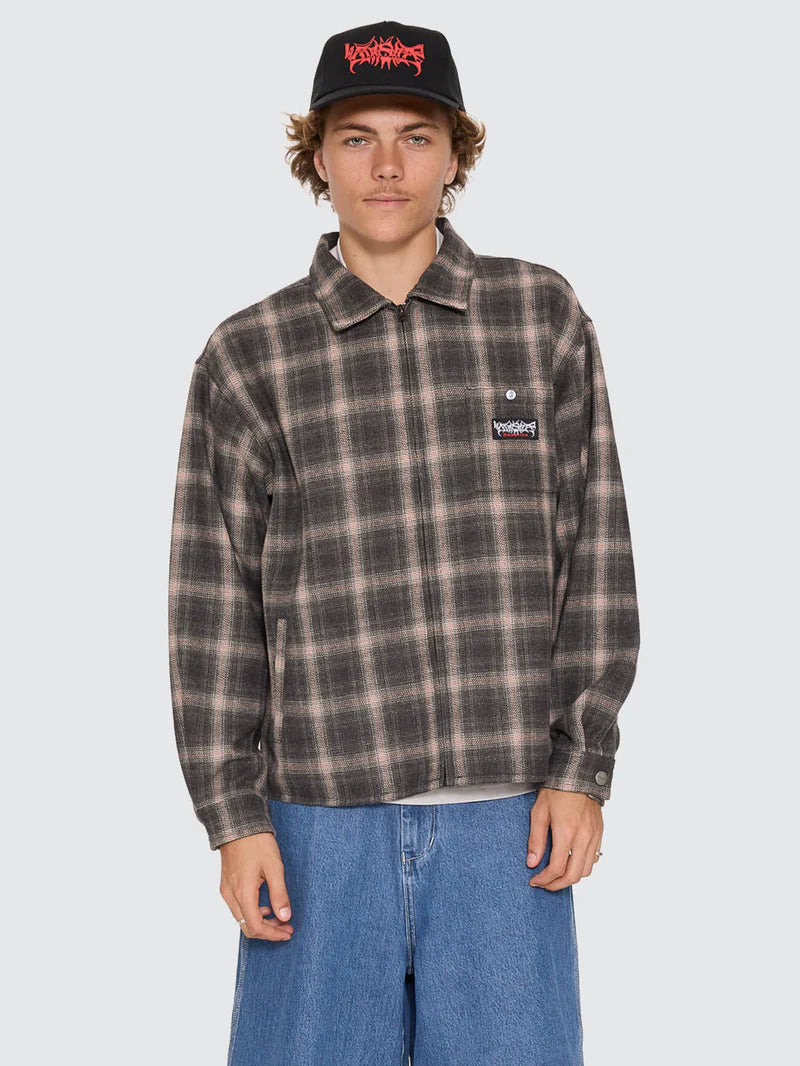 BROWN ZIP UP JCKET WITH A BUTTONED FRONT POCKET DISPLAYING THE WORSHIP LOGO