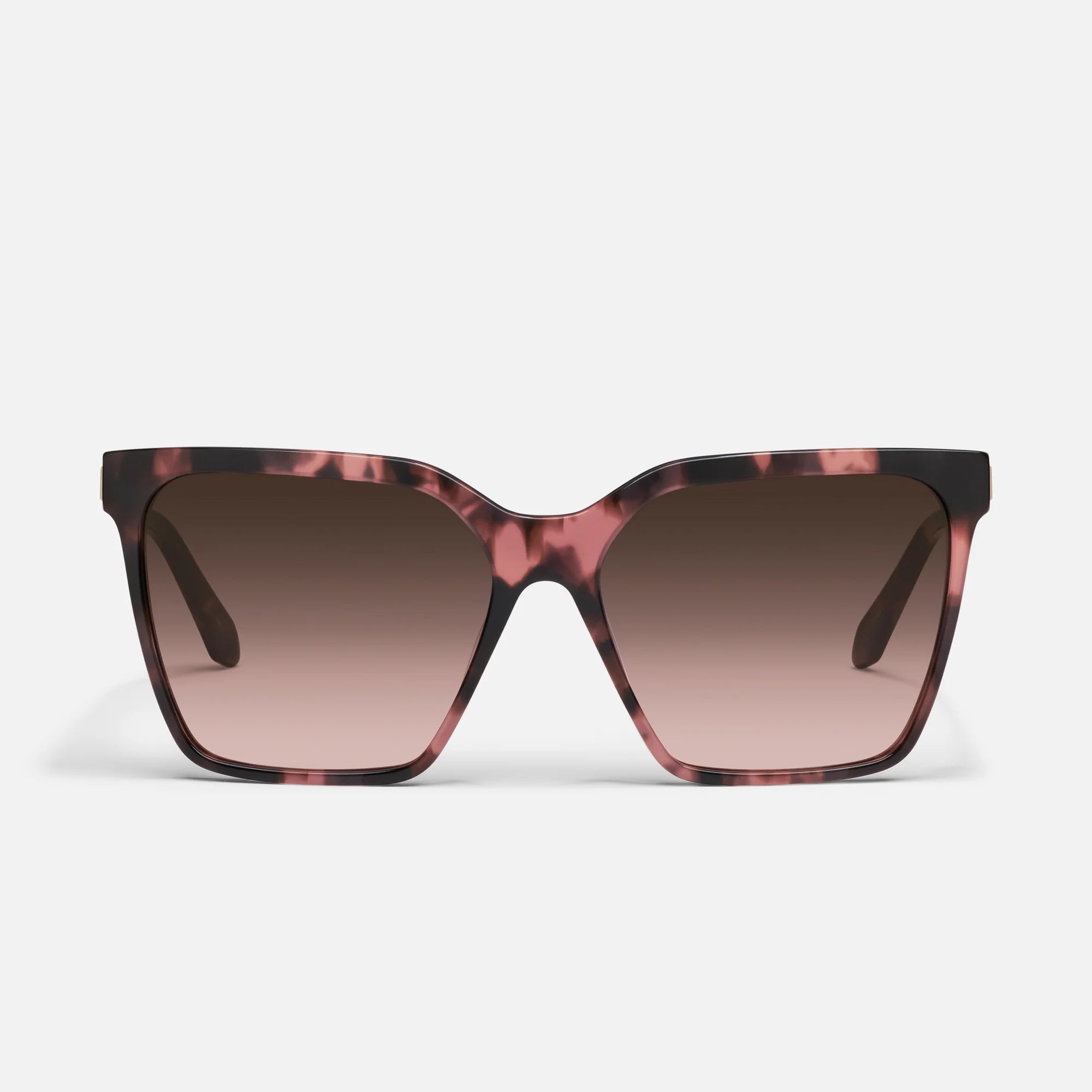 Sunglasses with a tortoiseshell frame and brown gradient lenses on a white background