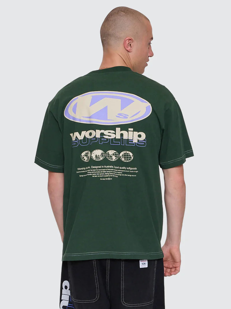 Person wearing a green t-shirt with 'worship supply' logo on the back, standing against a white background