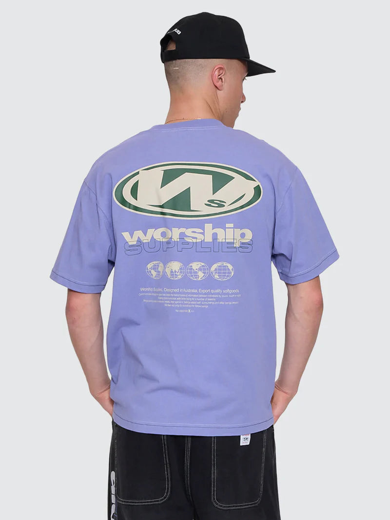 Person wearing a purple t-shirt with 'Worship Supplies' logo and text on the back, standing against a plain background.
