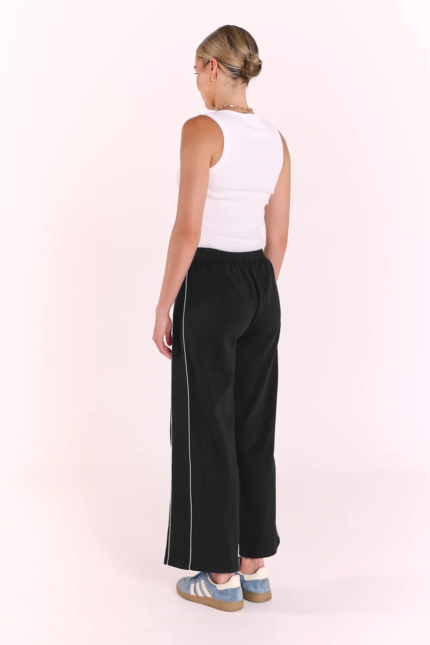 cropped navy blue pant with pale blue piping