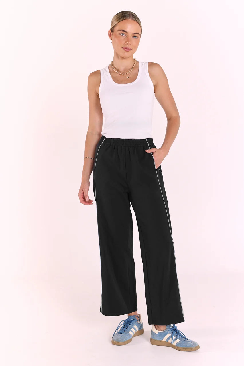 cropped navy pant with pale blue piping