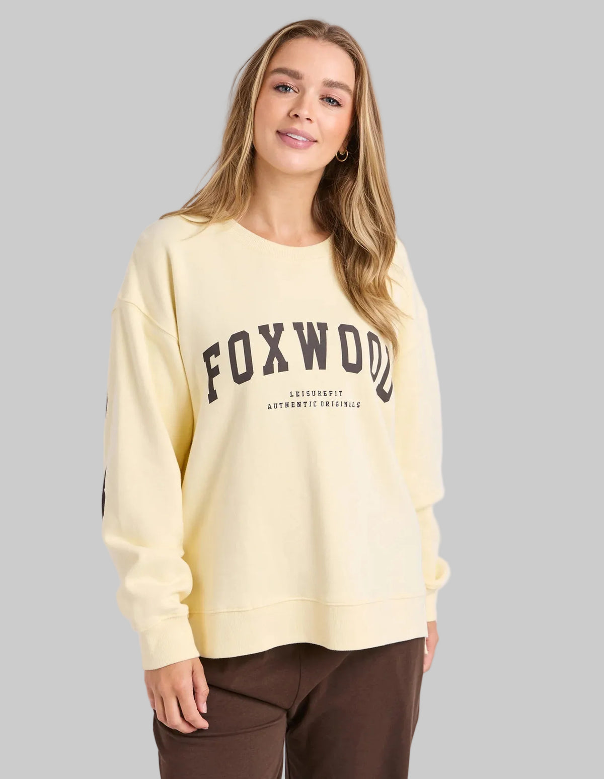 foxwood yellow crew with brown writing across front and back