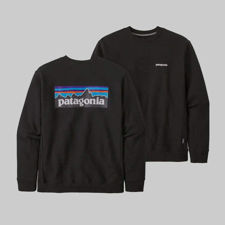 Front and back view of a black crew sweatshirt with the Patagonia logo on the chest.