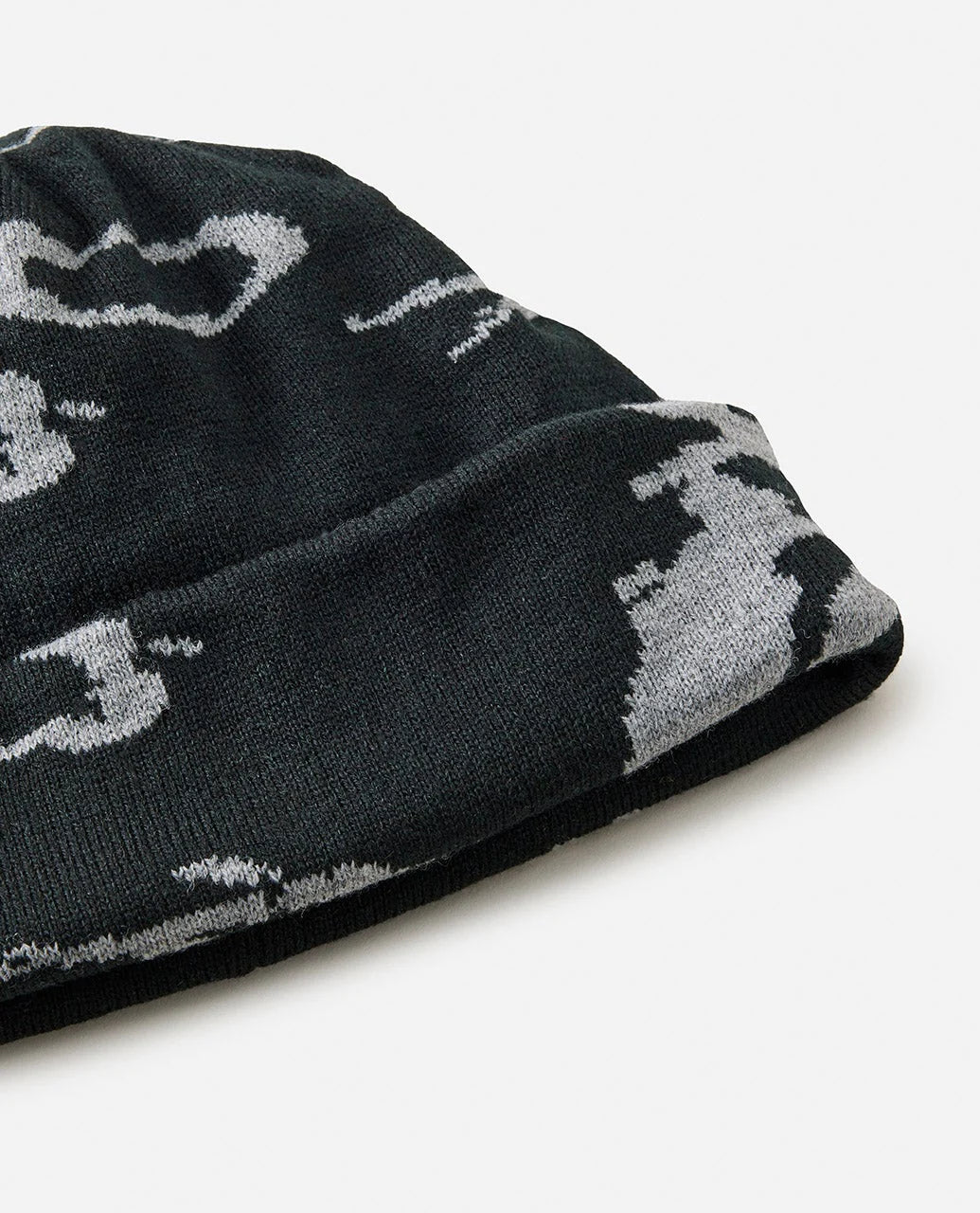 Black beanie with white patterns on a light gray background