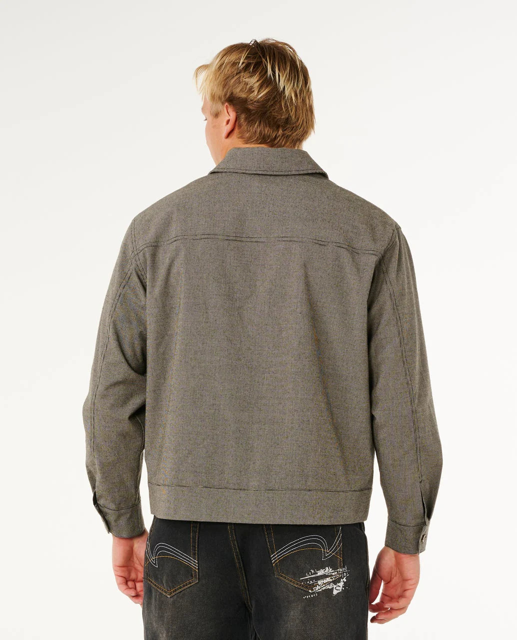 Man wearing a gray jacket from behind on a white background