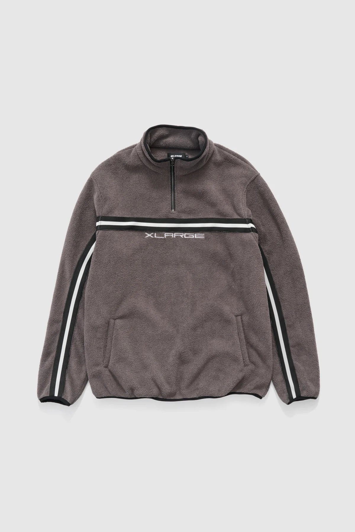 Gray fleece jacket with white stripes on a light gray background