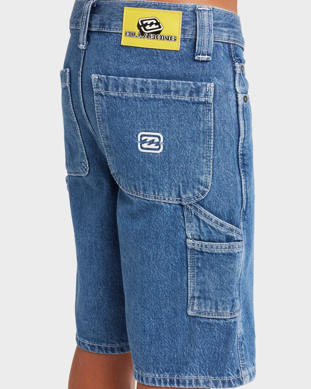 Blue denim shorts with brand logos on a white background