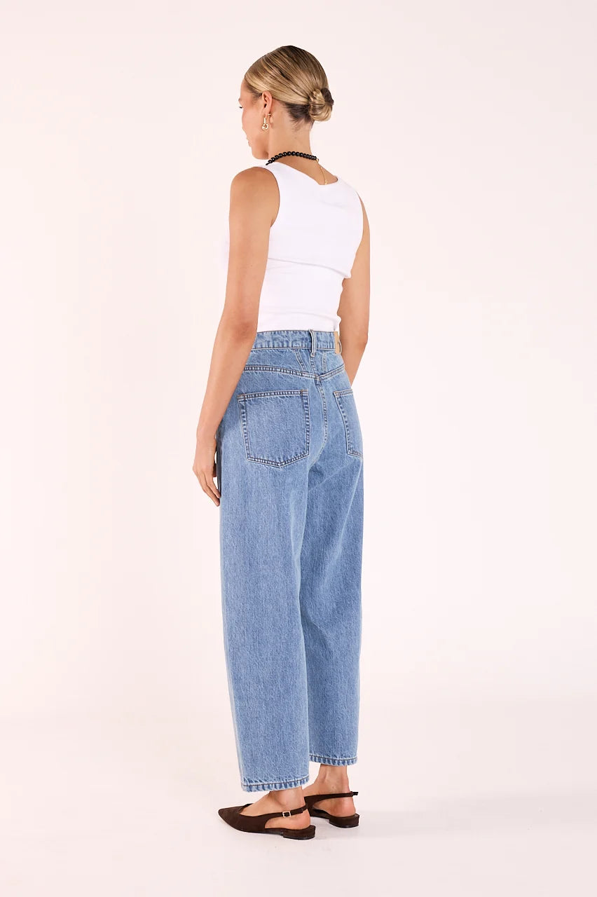cropped barrel leg blue jeans