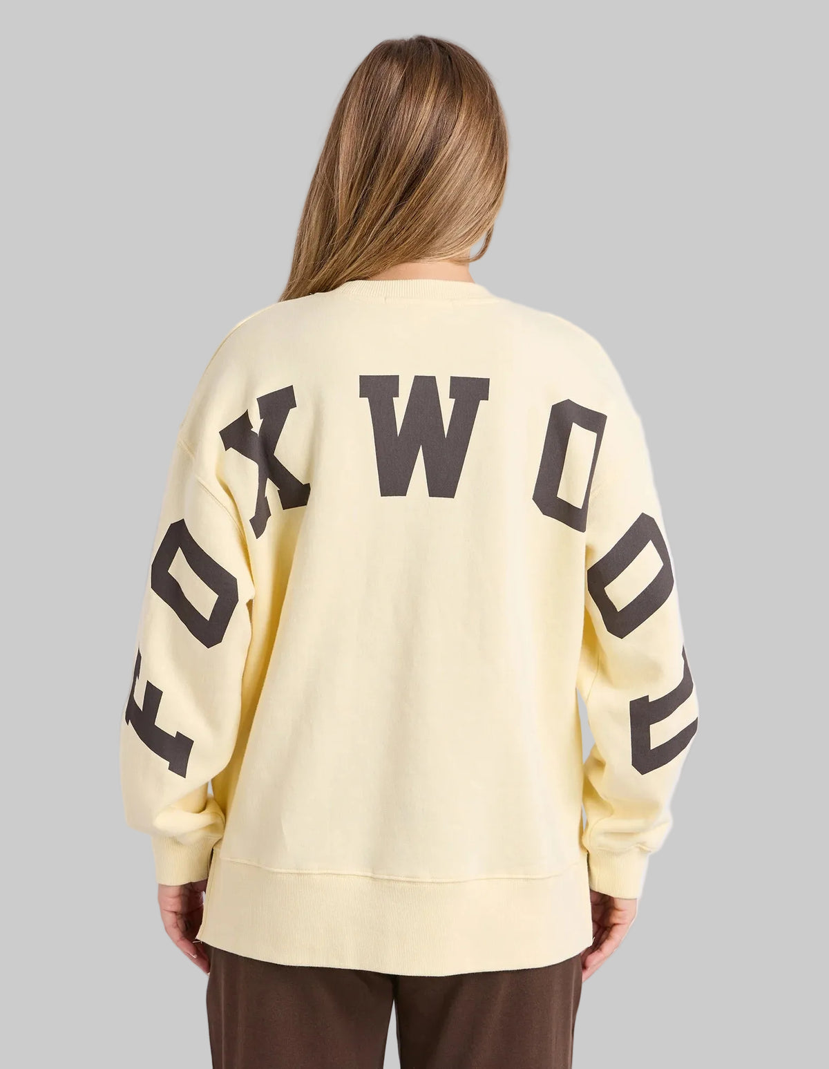 foxwood yellow crew with brown writing across front and back